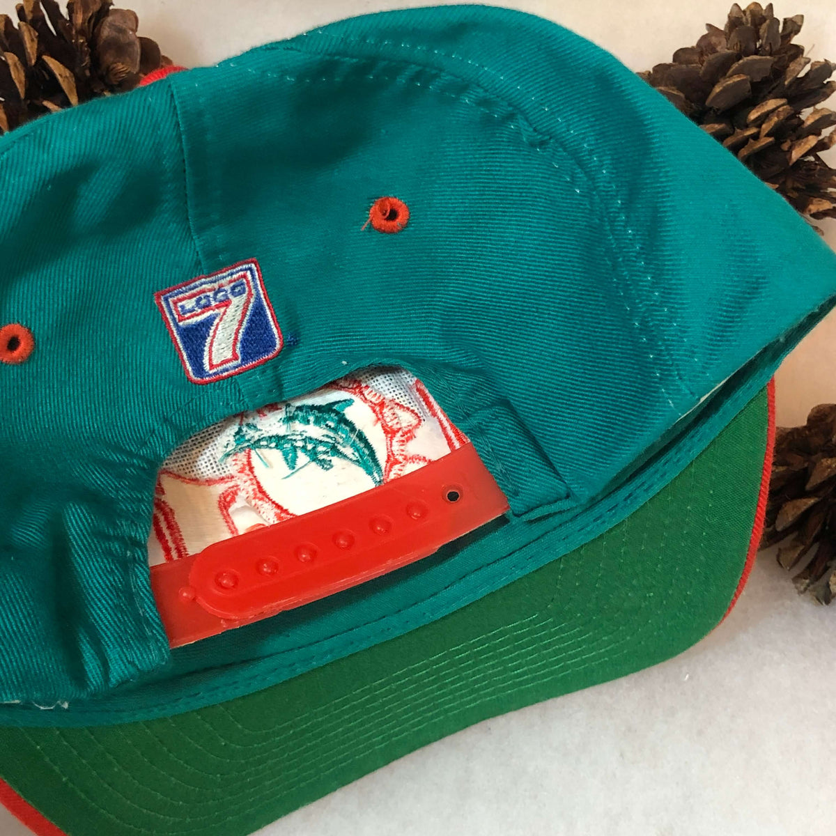 Vintage NFL Miami Dolphins Logo 7 Spellout Wraparound Snapback Hat – 