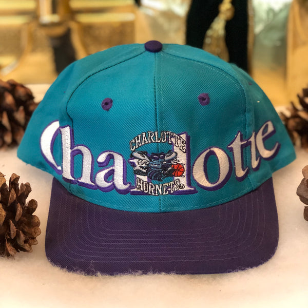 Vintage Logo 7 NBA Charlotte Hornets Spellout Snapback Hat
